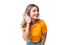 Young Uruguayan Woman Over Isolated Background Listening To Something By Putting Hand On The Ear