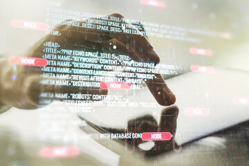 double exposure of abstract programming language hologram with finger clicks on a digital tablet on 