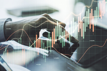 Multi exposure of abstract creative financial chart with finger presses on a digital tablet on background, research and analytics concept