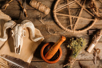 Magic attributes on wooden table, top view