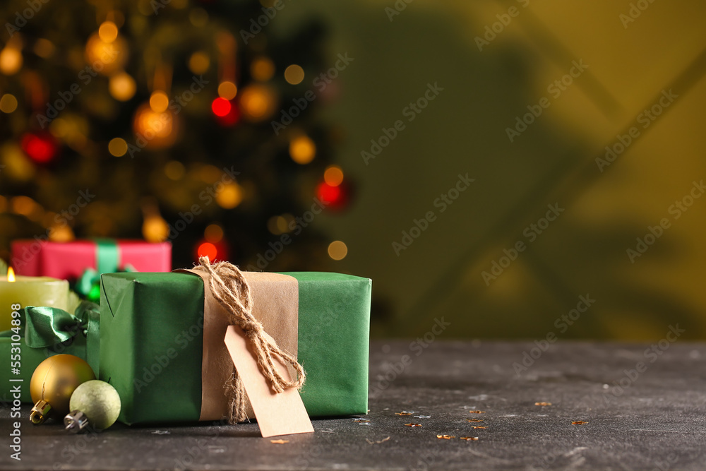 Christmas gift with tag on table