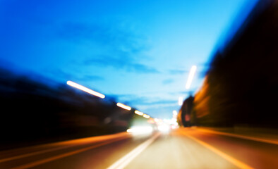 Canvas Print - Driving forward motion blur on the night road