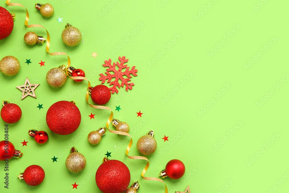 Beautiful composition with Christmas decorations on green background