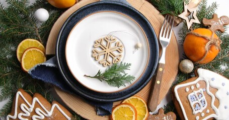 Poster - Christmas table setting. Holiday concept, rotate, top view.	
