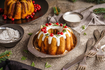 Wall Mural - Bowl with tasty Christmas cake and cutlery on table