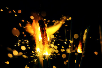 Wall Mural - blazing handheld firework as background