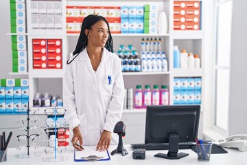 Sticker - African american woman pharmacist smiling confident working at pharmacy