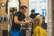 © PoppyPix - Male hairdresser blowdrying blond woman hair. High quality photo
