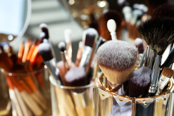 Set of professional brushes and mirror, closeup