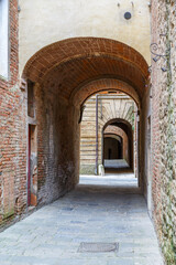 Canvas Print - Dark alley in a back street