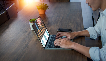 Freelance man reading online content blog job search of social media, freelancer, online job, content creator, using laptop, online on company office computer