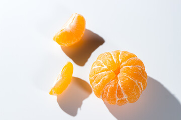 Poster - Peeled tangerine on a white background. citrus fruit