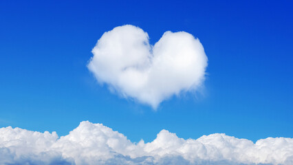 Poster - on a blue sky with a single cloud in the shape of a heart. horizontal frame