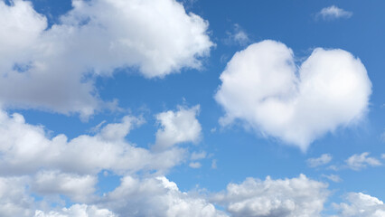 Poster - on a blue sky, a heart-shaped cloud with cumulus clouds