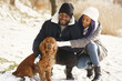 © prostooleh - African american couple in a winter forest