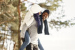 © prostooleh - African american couple in a winter forest