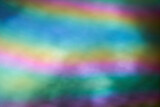 Fototapeta Tęcza - Blurry holographic rainbow color. Abstract bright holographic texture design for drawing and background. Minimalist style. High quality photo
