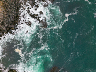  Aerial shot of the pacific ocean at Pichilemu, Chile