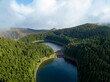 Magical aerial view of the Lake of Empadadas in Sete Cidades, landscape view of the lagoon with a light of sun and some mist. São Miguel island in the Azores.