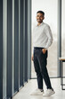 © dsheremeta - Young Hindu businessman posing near the window in the office.