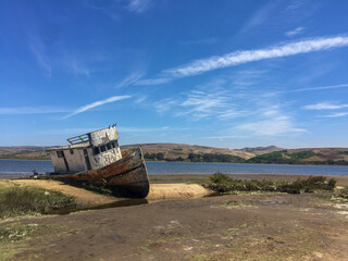 Naklejka na meble old fishing boat abandoned along the shore located just north of San Francisco in Reyes Park