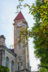 Stunning limestone clock tower on college campus in Bloomington