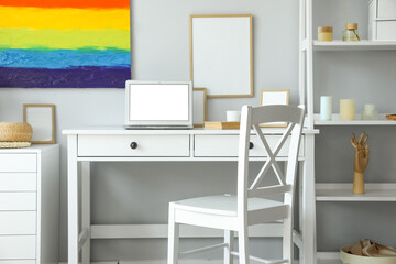 Poster - Interior of light office with workplace and rainbow painting