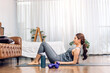 Portrait sport asian beauty body slim woman in sportswear sitting relax and girl practicing yoga and do fitness exercise in bedroom at home.Diet concept.Fitness and healthy