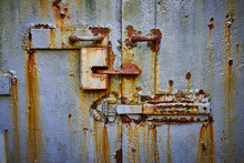 Detail Of Old Mine Entrance Door Made Of Steel And Rusting