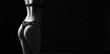 © Andrii Lysenko - Black and white photo of sexy woman's booty on black background. Copy space
