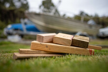 Wood Chocks For A Caravan And Camping. Chocks Behind A Tyre. Camping Chocks For A Boat Trailer Of Travellers