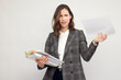 © Martin Villadsen - Frustrated female worker and young business woman holding a pile of paperwork.