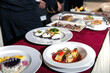 © Dan - Preparation and presentation of the menu in the restaurant. Food and drink.