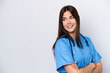 © luismolinero - Young Brazilian nurse woman isolated on white background with arms crossed and happy
