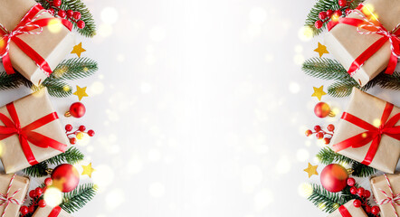 festive new year layout with place for text. christmas decorations, gifts and fir branches on a white background. top view. flat lay. copy space. red and green colors.