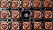 Chocolate hearts of candies with one missing in a box, top view
