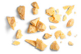 Fototapeta  - Hard mature cheese (Parmesan, Parmigiano), rough pieces top view isolated png