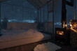 © Brilliant Eye - 3D rendering of cozy hut with bed and glass panels in front of starry sky at night