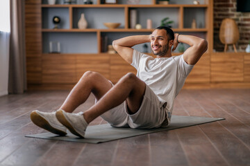 Abs Workout. Sporty Young African American Man Doing Crunches At Home