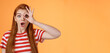 Surprised excited shocked young redhead girl gasping impressed look through okay circle, stare camera astonished awesome sale, open mouth say wow thrill and amazement, orange background