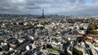 Tour Eiffel and Pantheon in background on cloudy day, Paris in France. Aerial drone panoramic view