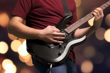 Poster - guitarist young man with modern guitar