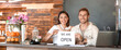 © Pixel-Shot - Happy young business owners in their new cafe