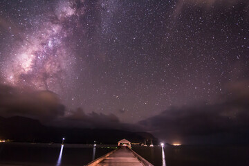 hanalei pier kauai under the milky way night sky