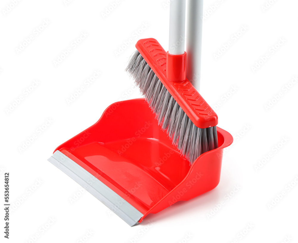 Dustpan with broom isolated on white background, closeup