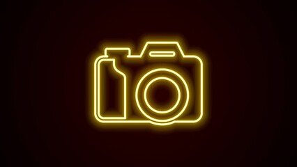 Wall Mural - Glowing neon line Photo camera icon isolated on black background. Foto camera. Digital photography. 4K Video motion graphic animation