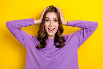 Poster - Photo of cheerful impressed person beaming smile arms touch head isolated on yellow color background