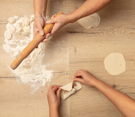 Sticker - Cooking dough with meat on the table.