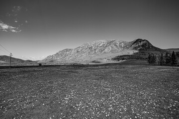 Black and white panorama of Piatra Secuiului Mountain in the Romania