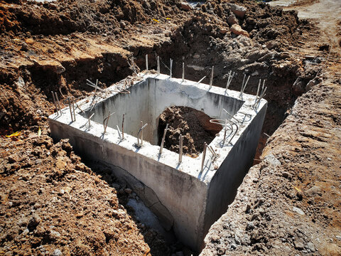 Concrete Drainage Pipe and manhole water system underground at construction site